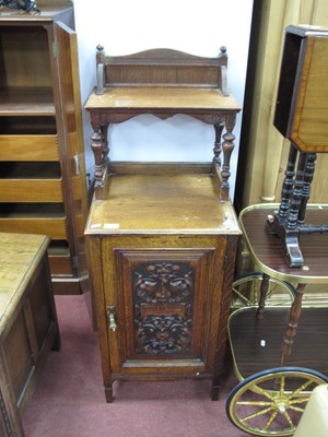 Lot 1630 - A Late XIX Century oak cabinet with a shaped...