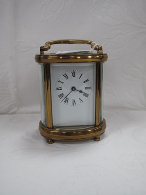 Lot 1456 - Brass Cased Carriage Clock, of oval form with...