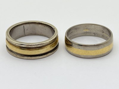 Lot 41 - Two Modern Bi-Metal Band Rings, (approximate...