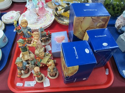 Lot 1269 - Nine Hummel Goebel figures to include Let's...