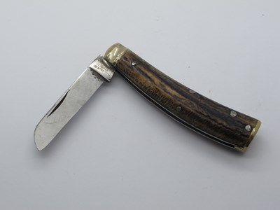 Lot 186 - Saynor Sheffield brass flat bottom knife, stag...