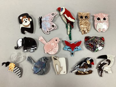 Lot 101 - An Assortment of Modern Plastic Brooches, of...