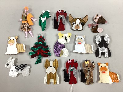 Lot 211 - An Assortment of Modern Plastic Brooches, of...