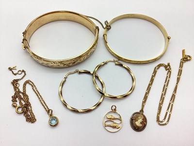 Lot 62 - Rolled Gold and Another Bangle, hoop earrings,...