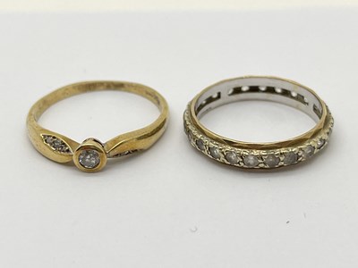 Lot 36 - A Modern Diamond Set Ring, rubover set to the...