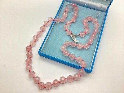 Lot 72 - A Modern Rose Quartz Single Strand Polished...