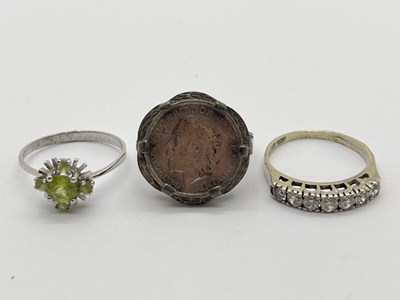 Lot 43 - A Modern CZ Dress Ring, uniform claw set,...