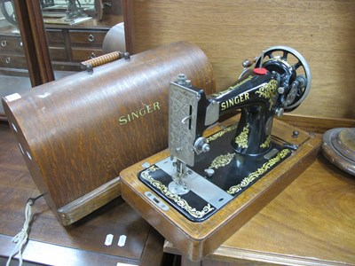 Lot 1494 - Singer Sewing Machine in case.