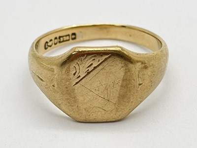 Lot 31 - A 9ct Gold Signet Ring, scrolling decoration...