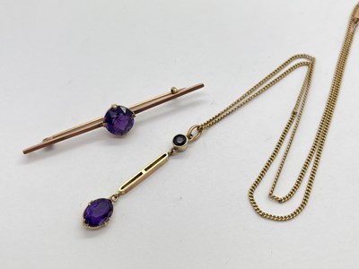 Lot 60 - An Edwardian Amethyst Set Drop Pendant, oval...