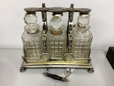 Lot 202 - A Spurrier & Co Plated Lockable Three Bottle...