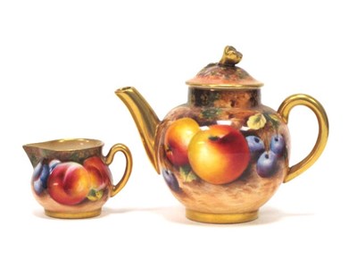 Lot 1104 - A Royal Worcester Porcelain Miniature Teapot...