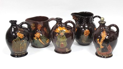 Lot 1244 - Three Royal Doulton Pottery Kingsware Flasks...