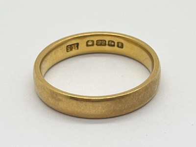 Lot 43 - A 22ct Gold Wedding Band, of plain design...