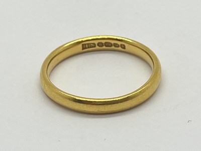 Lot 42 - A 22ct Gold Wedding Band, of plain design...