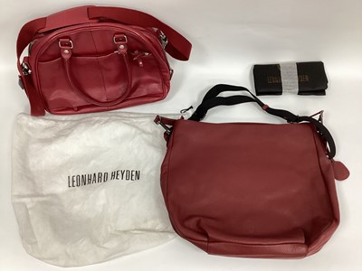 Lot 1381 - Leonhard Heyden; A Red Leather Cross Body Tote...