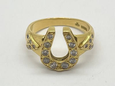 Lot 39 - An 18ct Gold Modern Diamond Horseshoe Ring,...