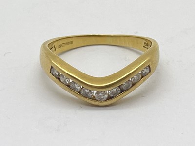 Lot 52 - An 18ct Gold Diamond Wishbone Ring, uniform...