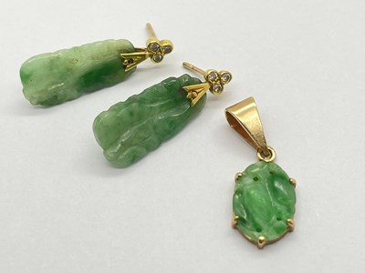 Lot 76 - A Pair of Carved Jade Drop Earrings, each with...