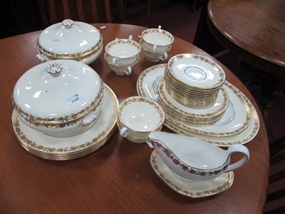 Lot 1147 - Wedgwood Whitehall Dinner Service in Gold and...