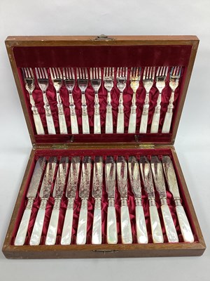 Lot 170 - A Decorative Set of Twelve Mother of Pearl...