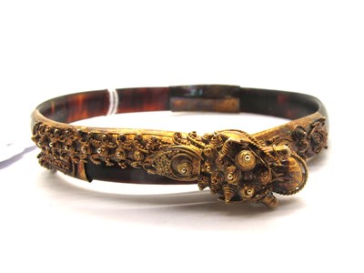 Lot 175 - A Chinese Style Tortoiseshell Wrap Bangle,...