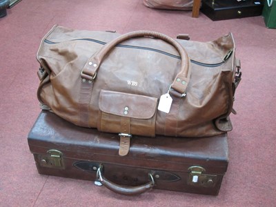 Lot 1380 - An Early XX Century quality leather suitcase;...