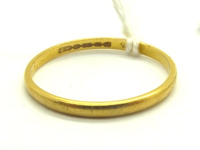 Lot 193 - A 22ct Gold Slim Wedding Band, (finger size S)...