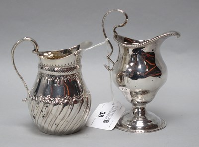 Lot 38 - A Georgian Hallmarked Silver Cream Jug, (marks...