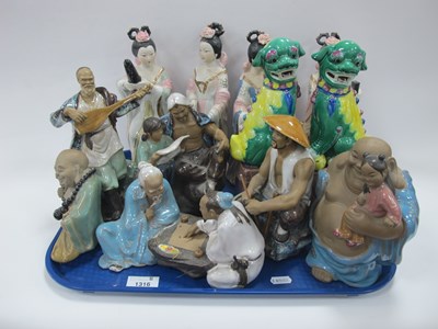 Lot 1316 - Oriental Pottery Figurines, Temple Lions:- One...