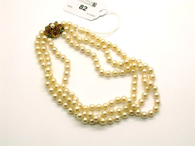 Lot 82 - A Three Strand Pearl Bead Necklace, the...