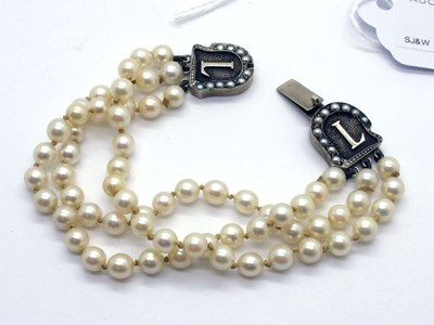 Lot 172 - A Three Strand Pearl Bead Monogram Clasp...