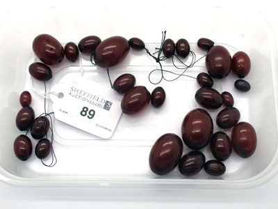 Lot 89 - Cherry Amber Colour Beads, (for restringing).