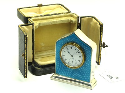 Lot 255 - A Hallmarked Silver and Enamel Bedside Clock,...