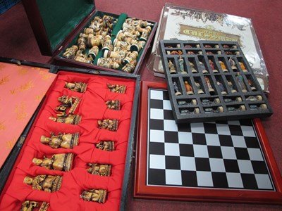 Lot 1426 - Chess Sets - Chinese Figures in Resin, with...