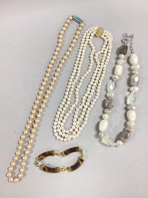 Lot 25 - A Modern Three Row Fresh Water Pearl Bead...