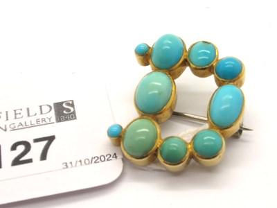 Lot 127 - An Antique Turquoise Cabochon Brooch, the...