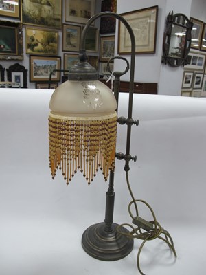 Lot 1406 - Brass Table Lamp, with beaded tassels to glass...