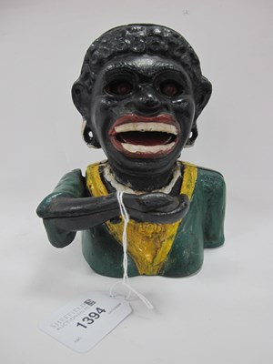 Lot 1394 - Painted Cast Iron 'Dinah' Money Box. 
These...