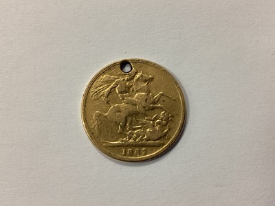 Lot 555 - 1887 Victoria Gold Sovereign, hole damage.