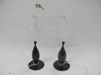 Lot 1291 - A Pair of Glass Erotic Dancers, on black...