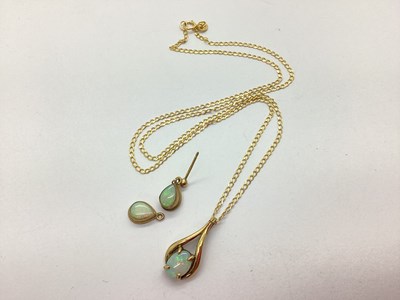 Lot 54 - A 9ct Gold Opal Set Drop Pendant, the oval...