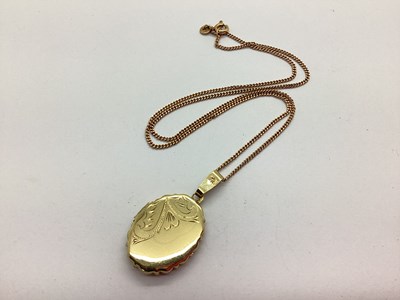 Lot 51 - A 9ct Gold Oval Locket Pendant, of fluted...