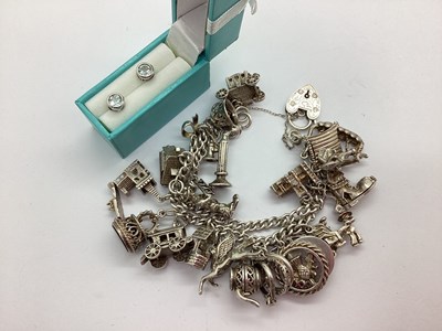 Lot 84 - A Chunky Double Row Charm Bracelet, to...