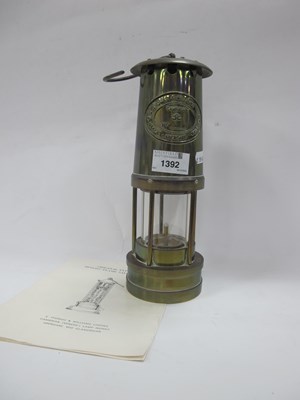 Lot 1392 - An E. Thomas & Williams miners lamp No. 51126,...