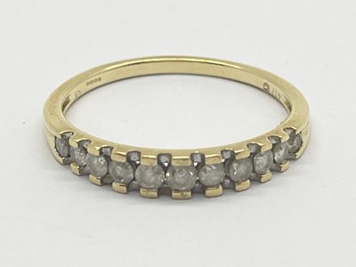 Lot 32 - Gemporia; A 9ct Gold Eleven Diamond Channel...