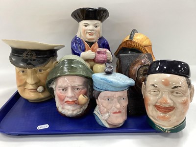 Lot 1159 - Jovial Monk Bookend, tobacco jars, toby jug,...