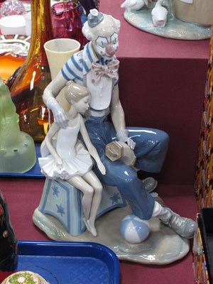 Lot 1260 - Lladro Figure Group of a Seated Clown and a...