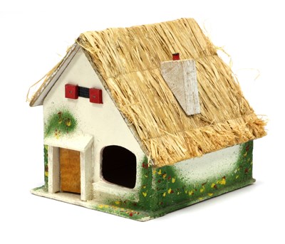 Lot 831 - A Britains #9668 Thatched Cottage. Wooden...