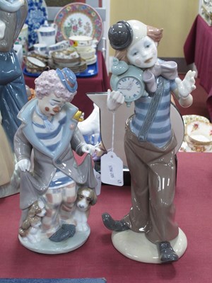 Lot 1282 - Lladro FIgurine, of a clown holding an alarm...